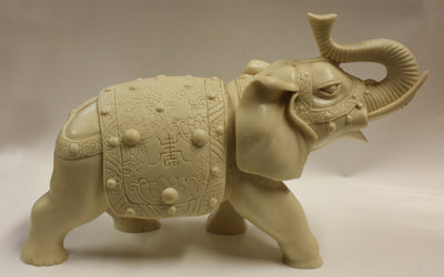 Статуэтка "Слон в попоне" из художественной кости