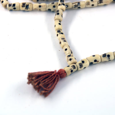 Чётки из кости, бусины в виде черепов (108 бусин)