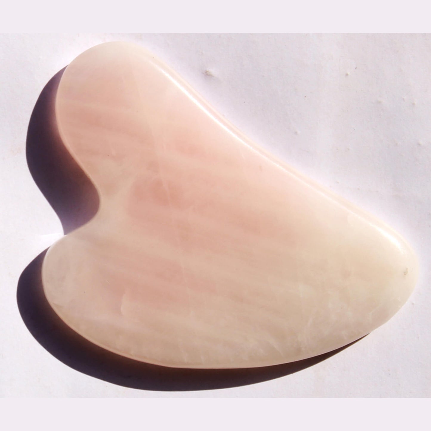 Массажер-скребок Гуаша из розового кварца